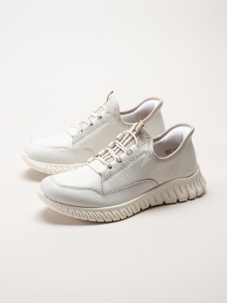 Rieker - Vita slip on skor i skinn