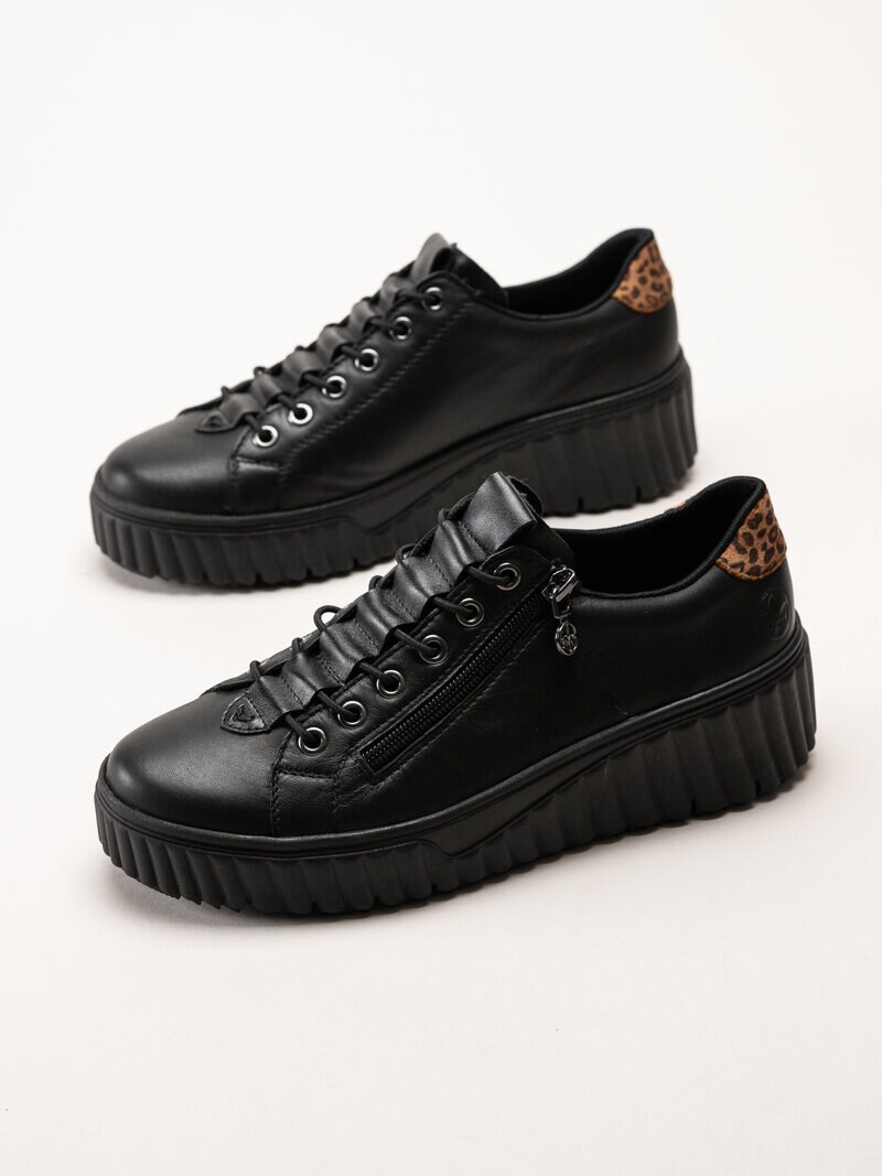 Rieker - Svarta sneakers i skinn