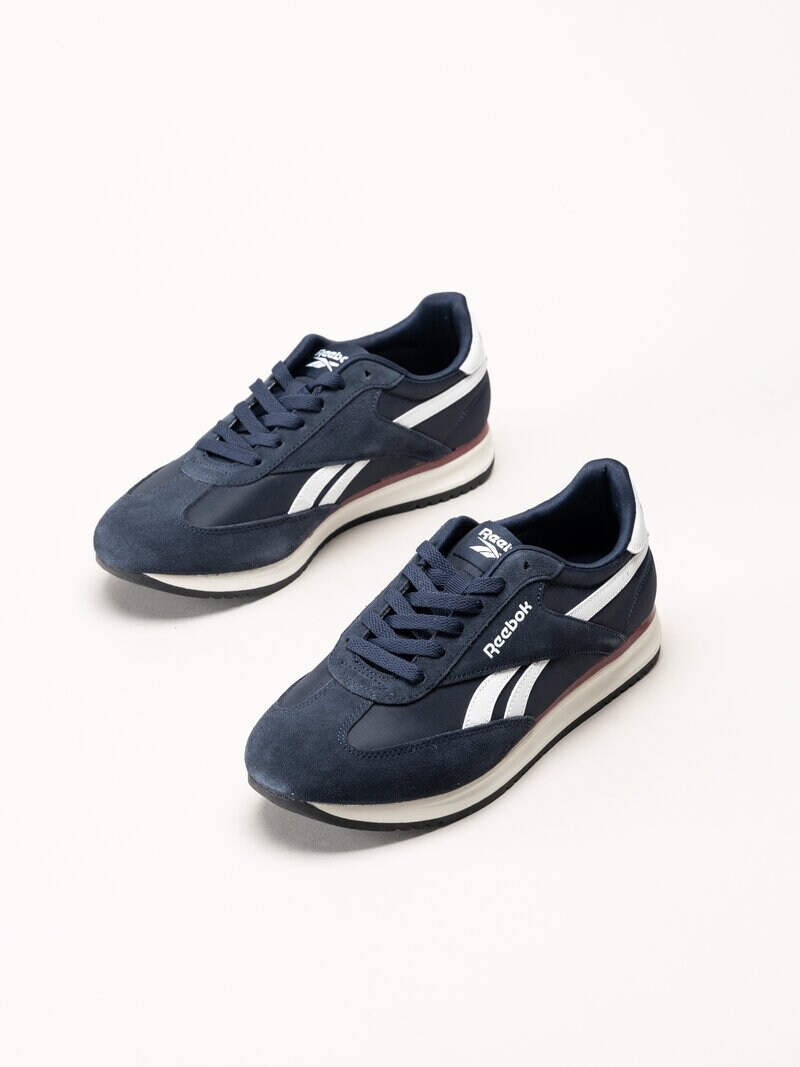 Reebok - World 70 - Mörkblå sneakers i mocka och textil