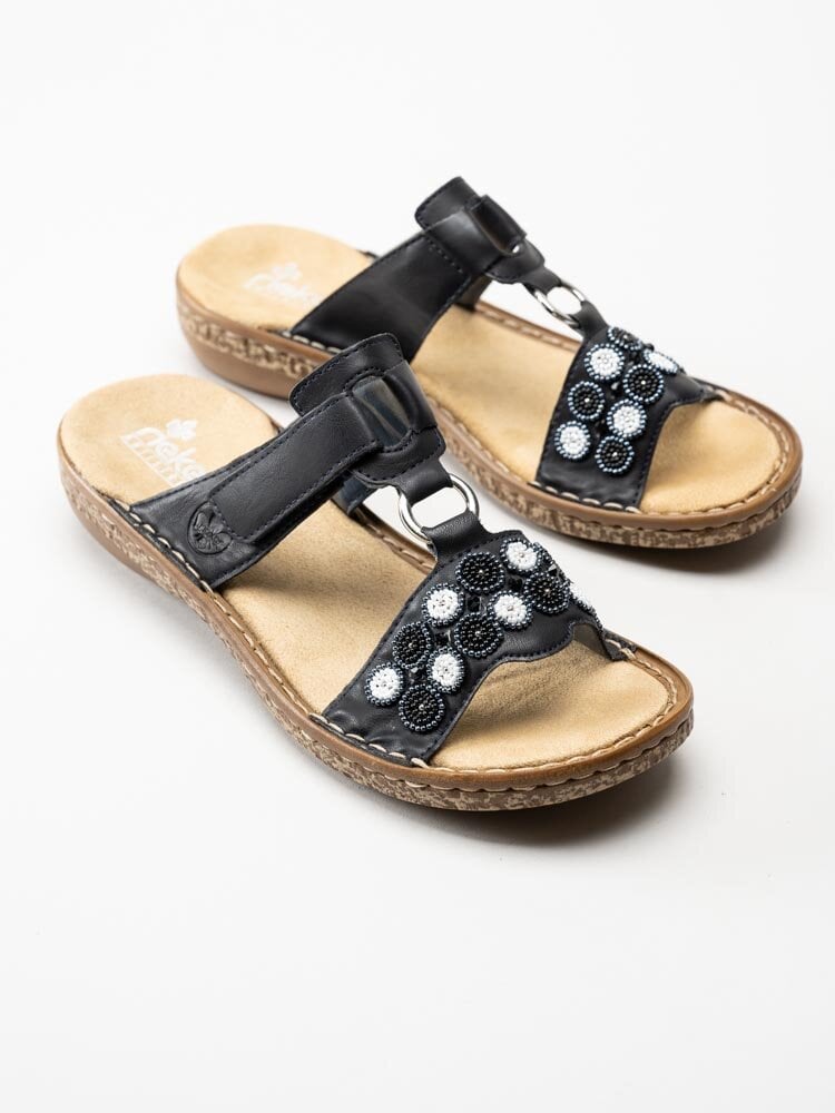 Rieker - Svarta slip in sandaler med blomdekor