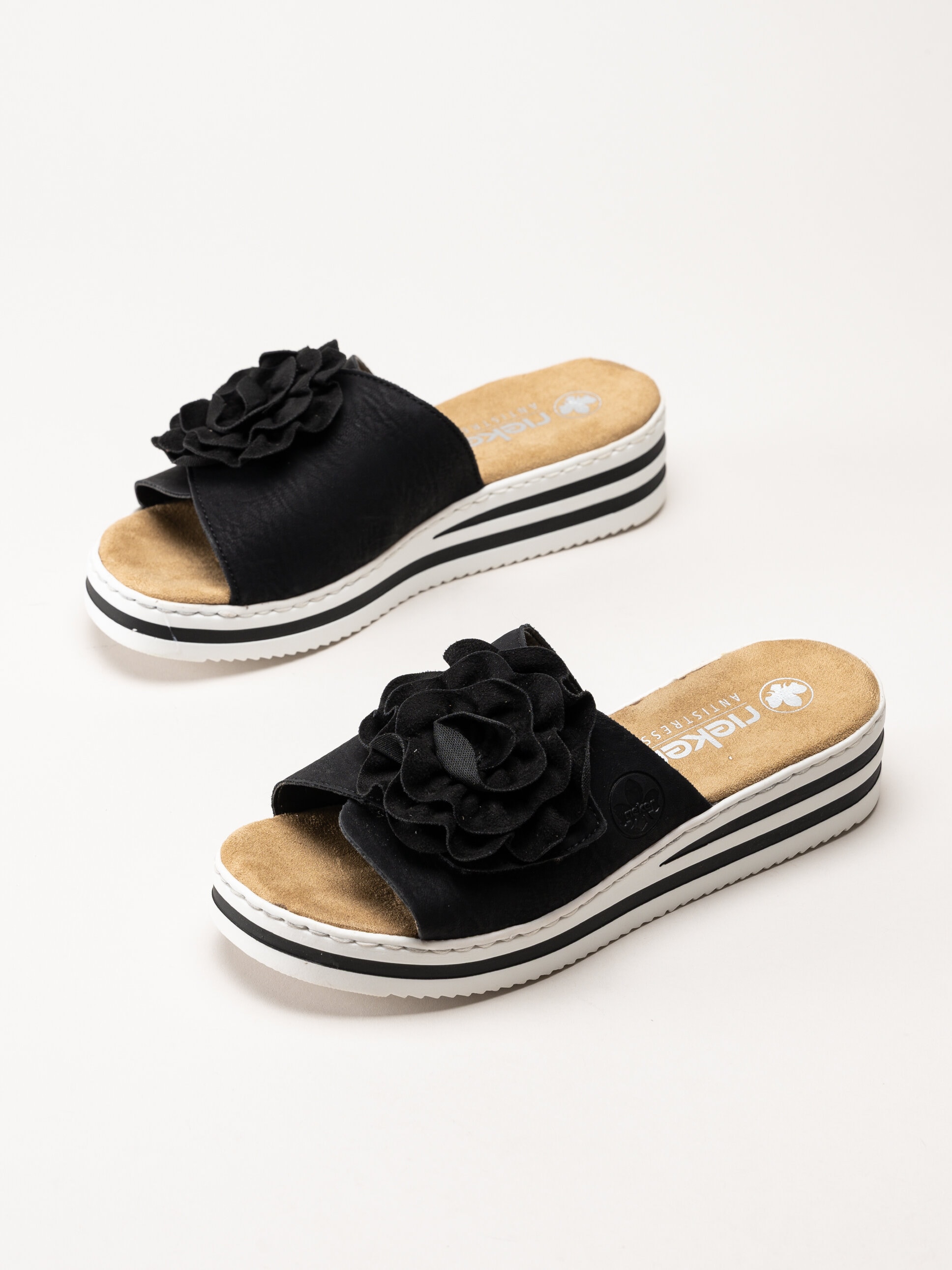 Rieker - Svarta slip in sandaler med rosett