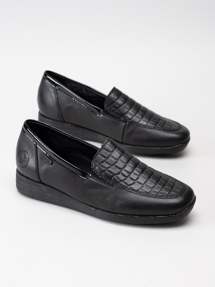 Rieker - Svarta kilklackade loafers i skinn