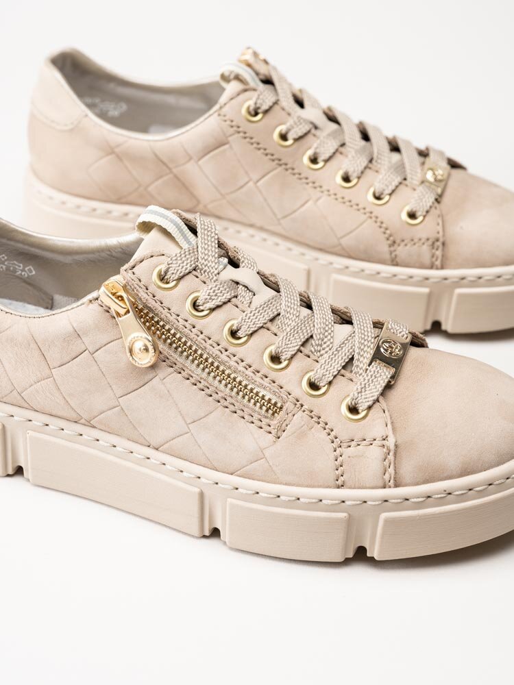 Rieker - Beige sneakers i nubuck med guldiga detaljer