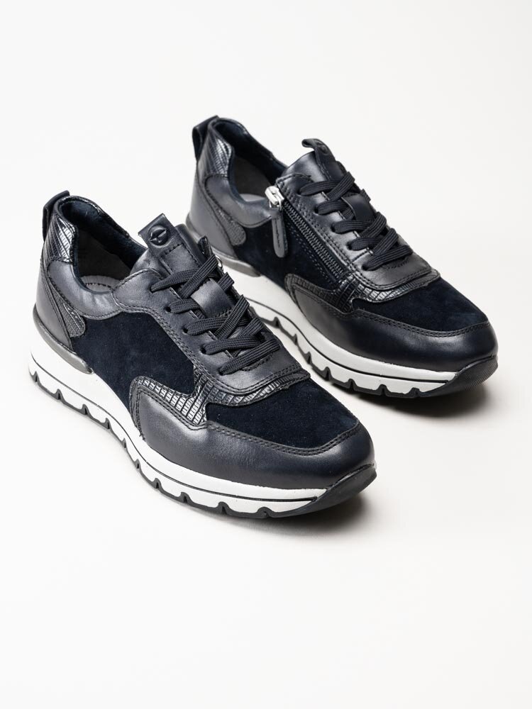 Tamaris - Mörkblå kilklackade sneakers i skinn