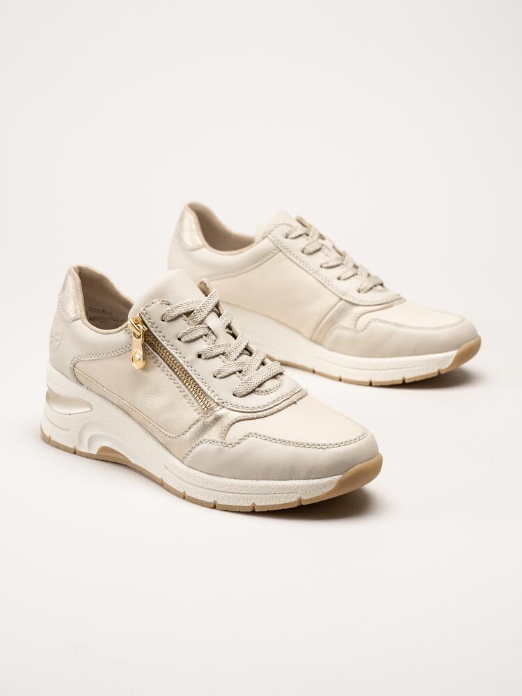 Rieker - Beige kilklackade sneakers i skinn