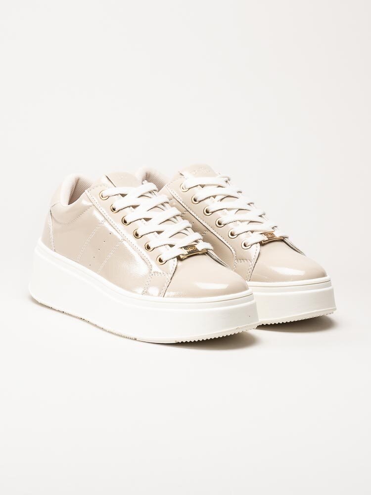 Duffy - Beige platåsneakers i lack