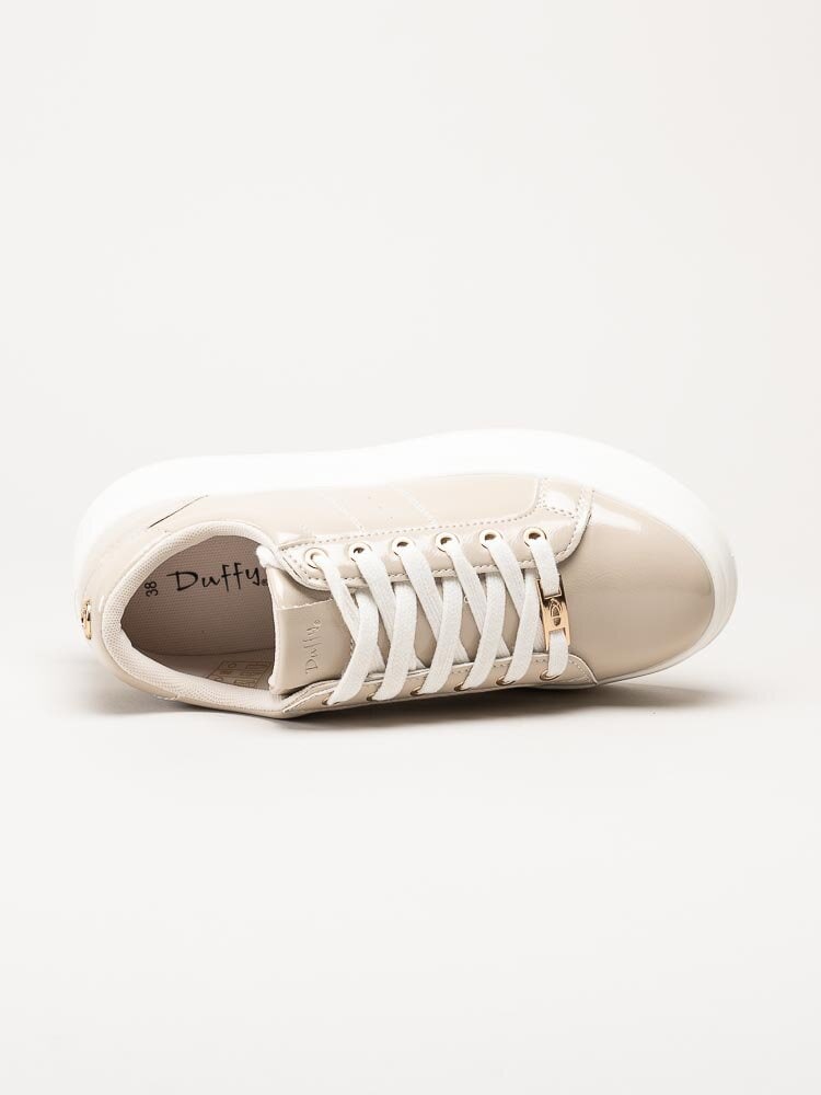 Duffy - Beige platåsneakers i lack