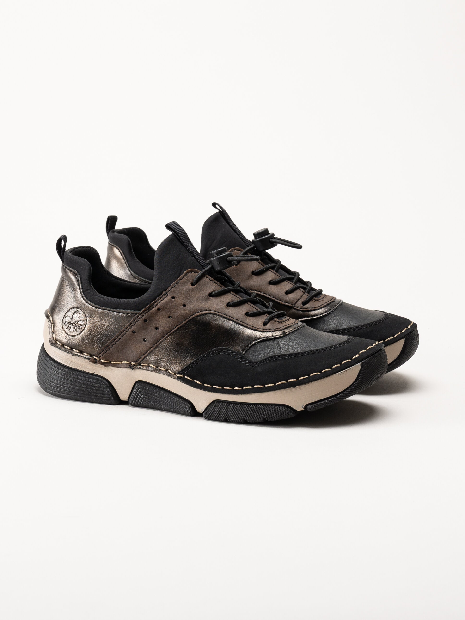Rieker - Svarta slip on promenadskor