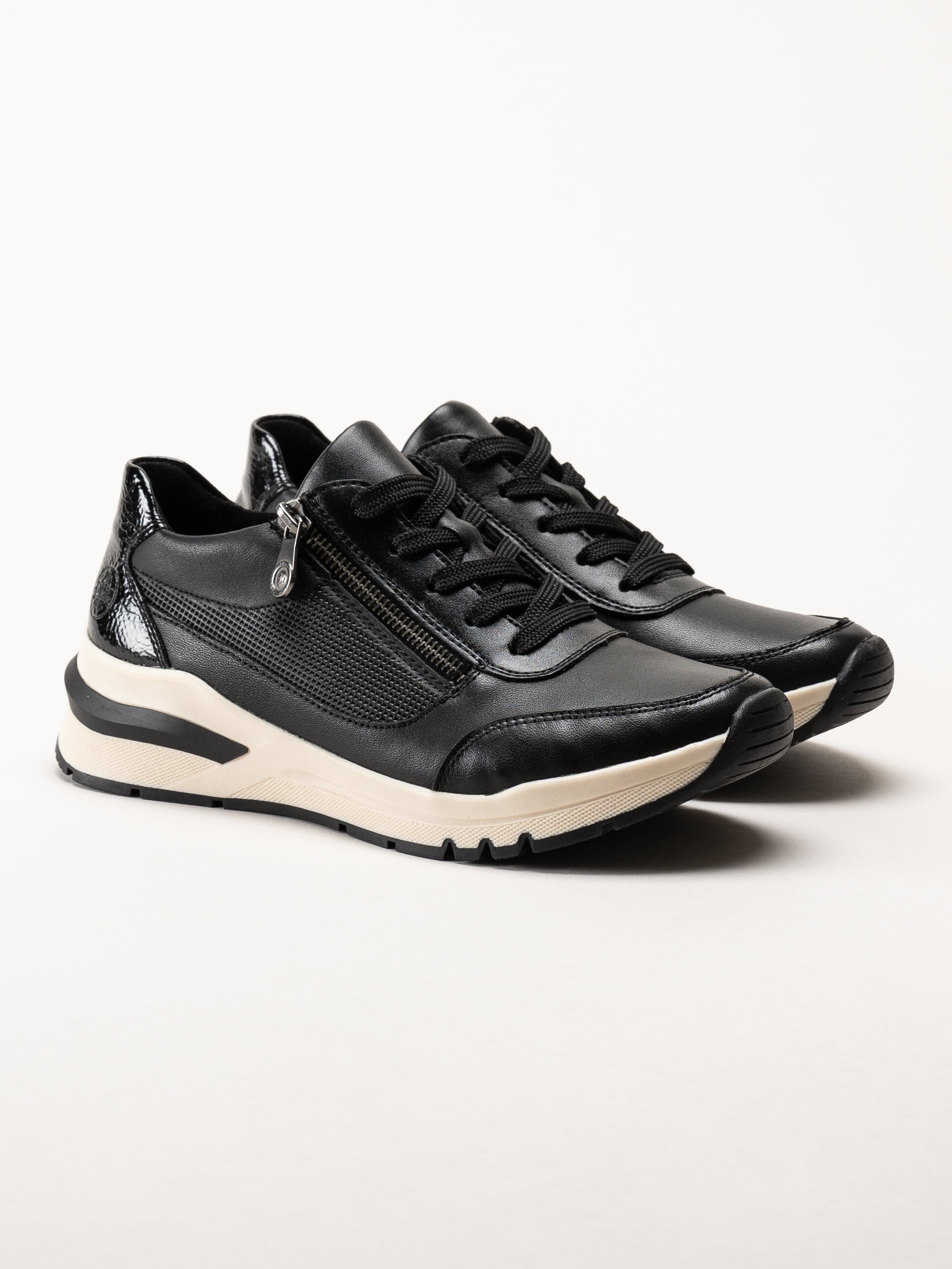 Rieker - Svarta promenadsneakers i skinn