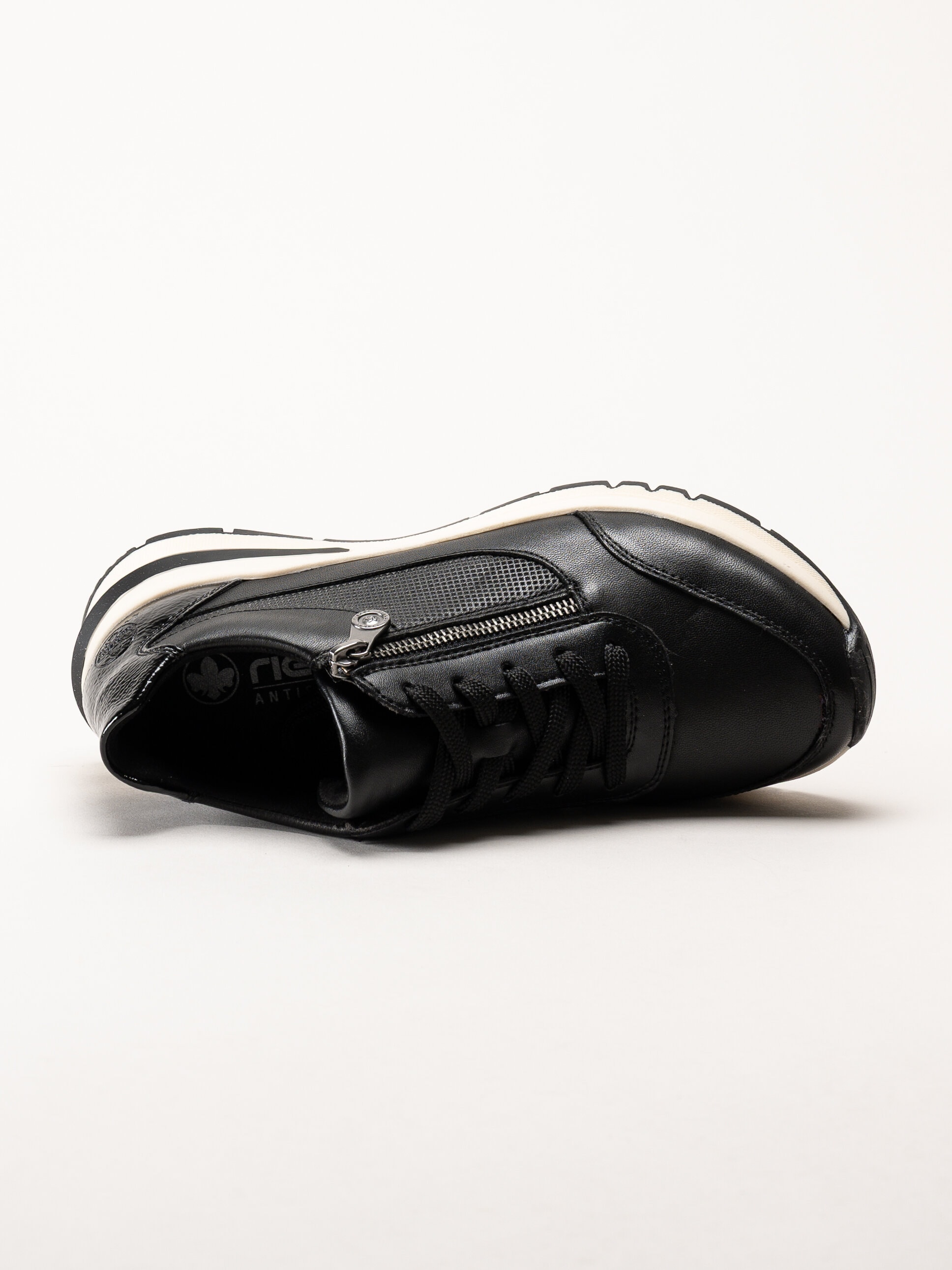 Rieker - Svarta promenadsneakers i skinn