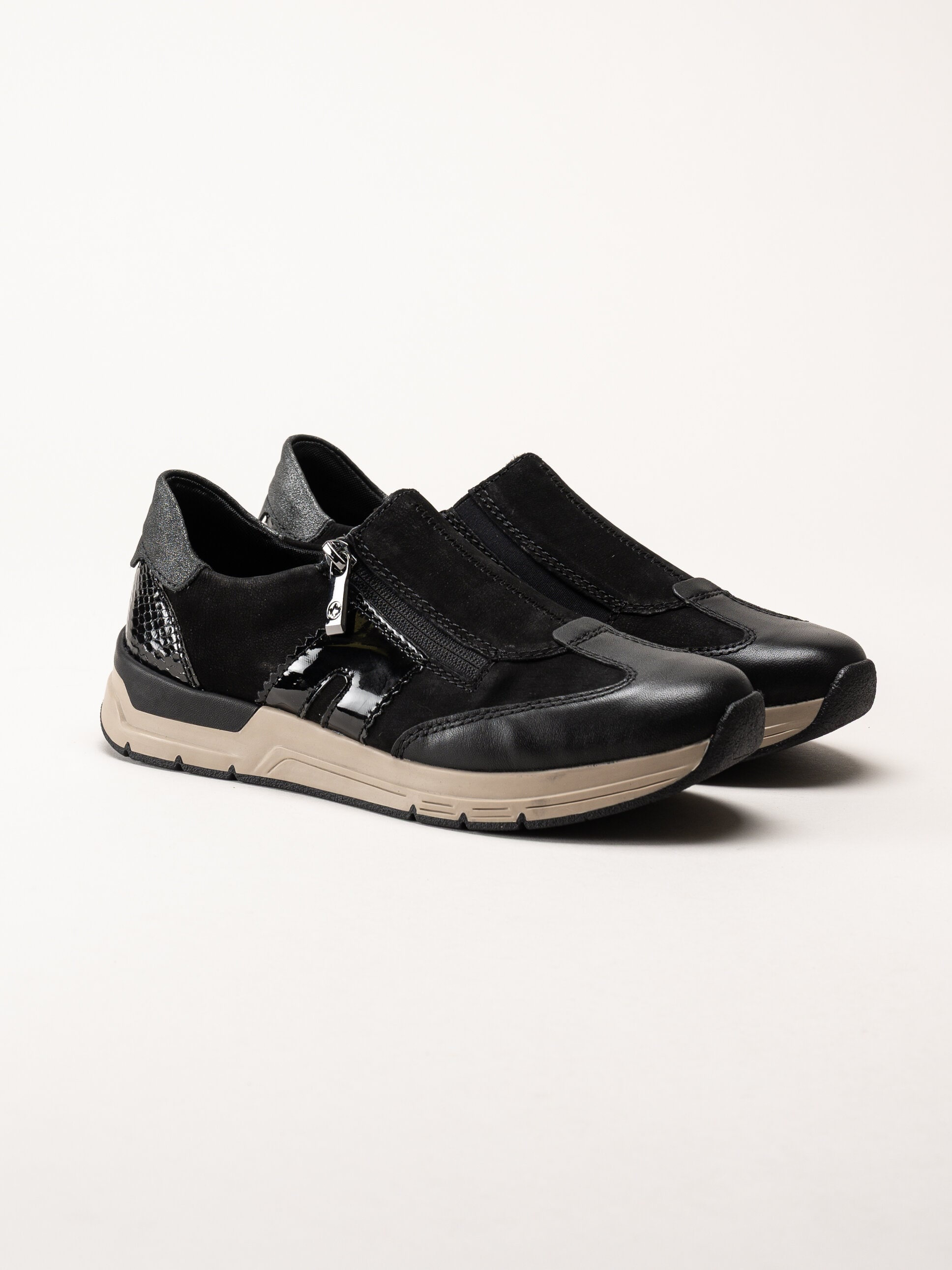 Rieker - Svarta promenadsneakers i nubuck och skinn