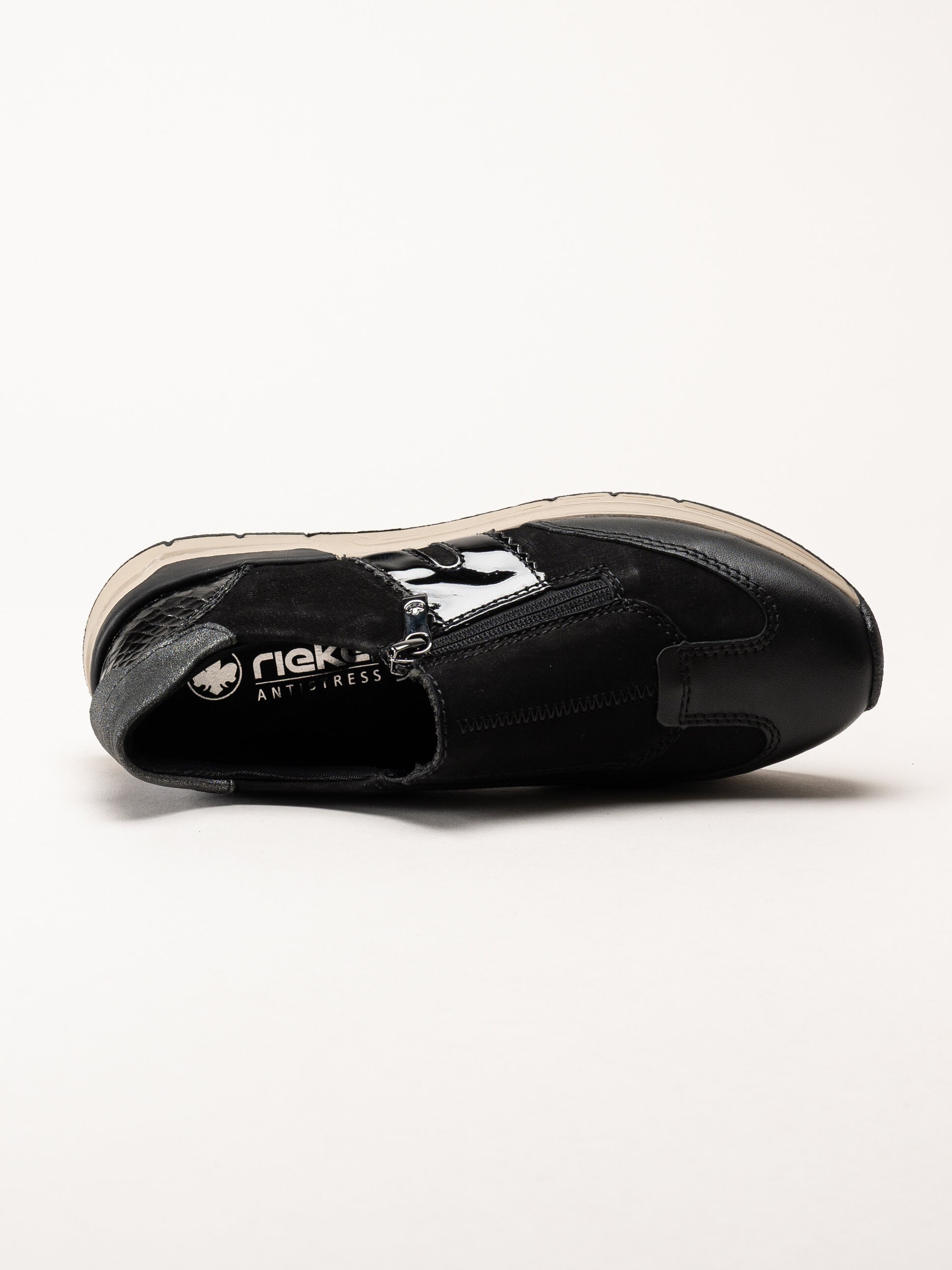Rieker - Svarta promenadsneakers i nubuck och skinn