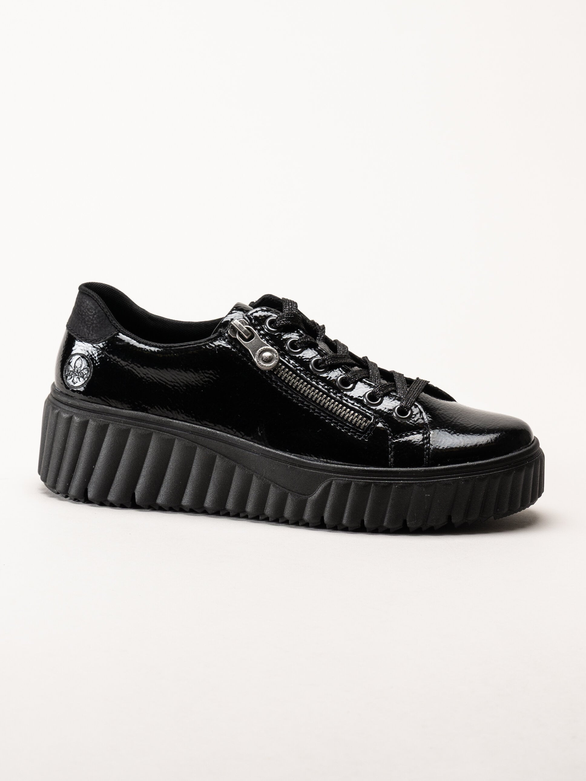 Rieker - Svarta platåsneakers i skinn-lack