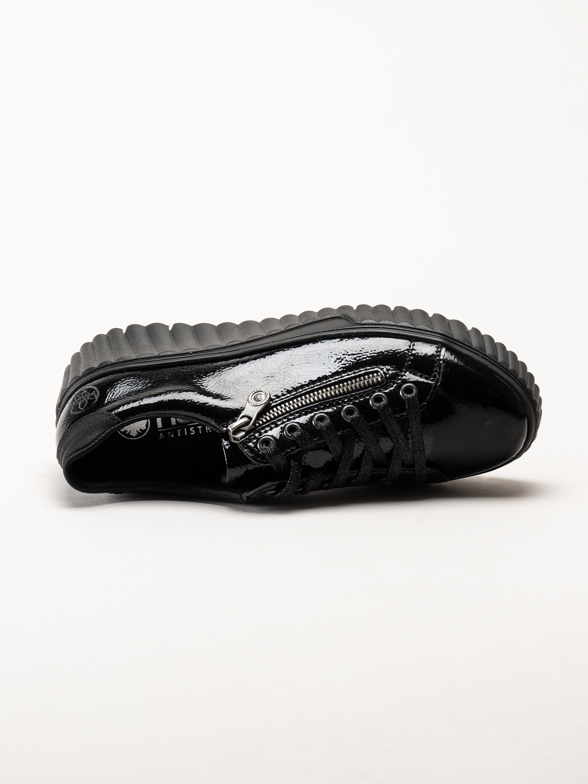 Rieker - Svarta platåsneakers i skinn-lack