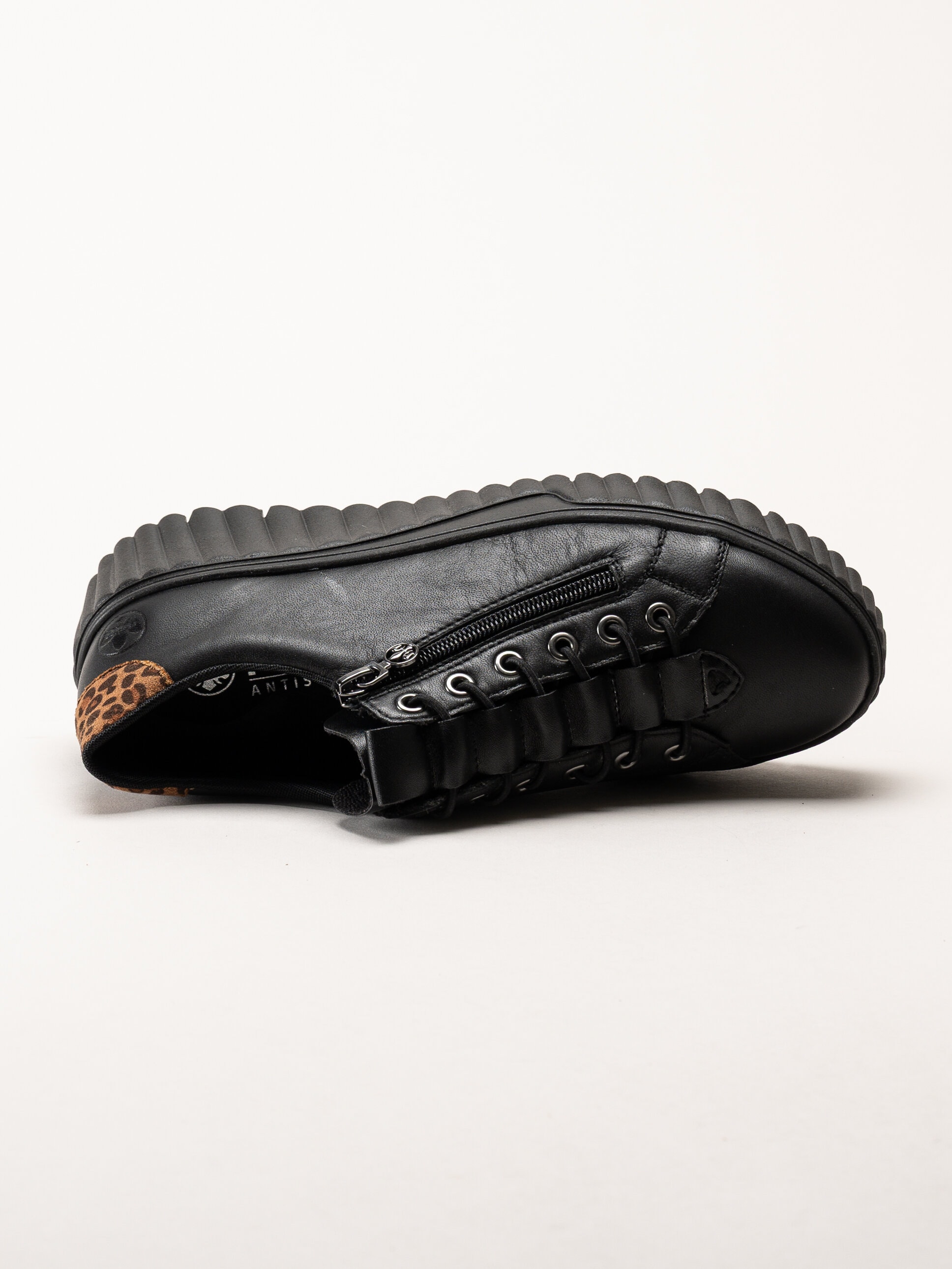 Rieker - Svarta sneakers i skinn