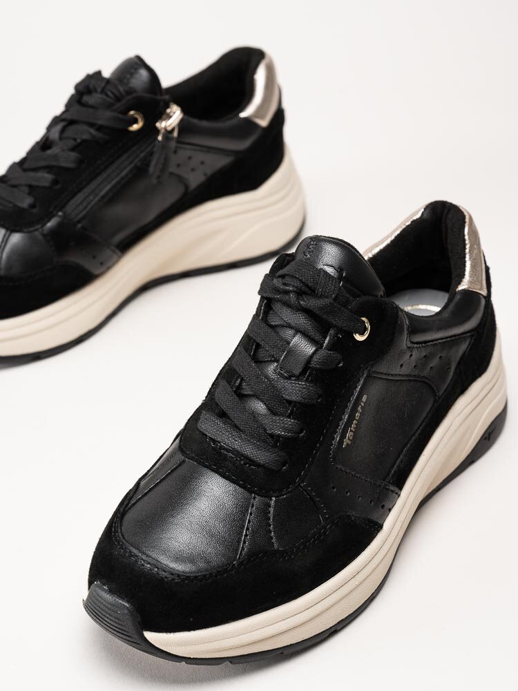 Tamaris - Svarta sneakers i skinn