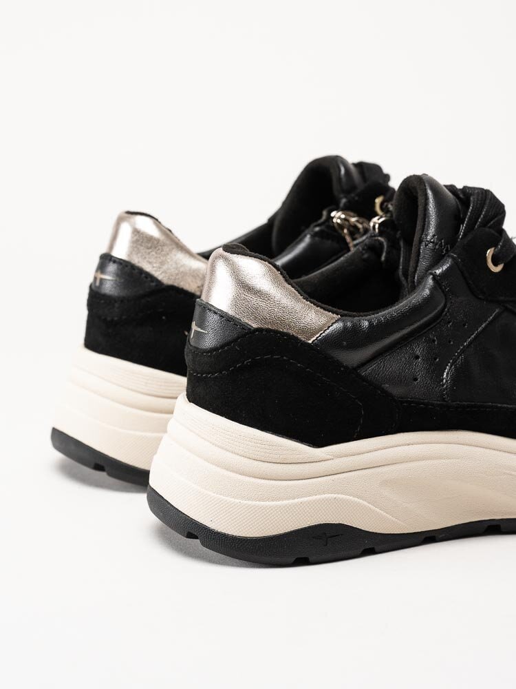Tamaris - Svarta sneakers i skinn