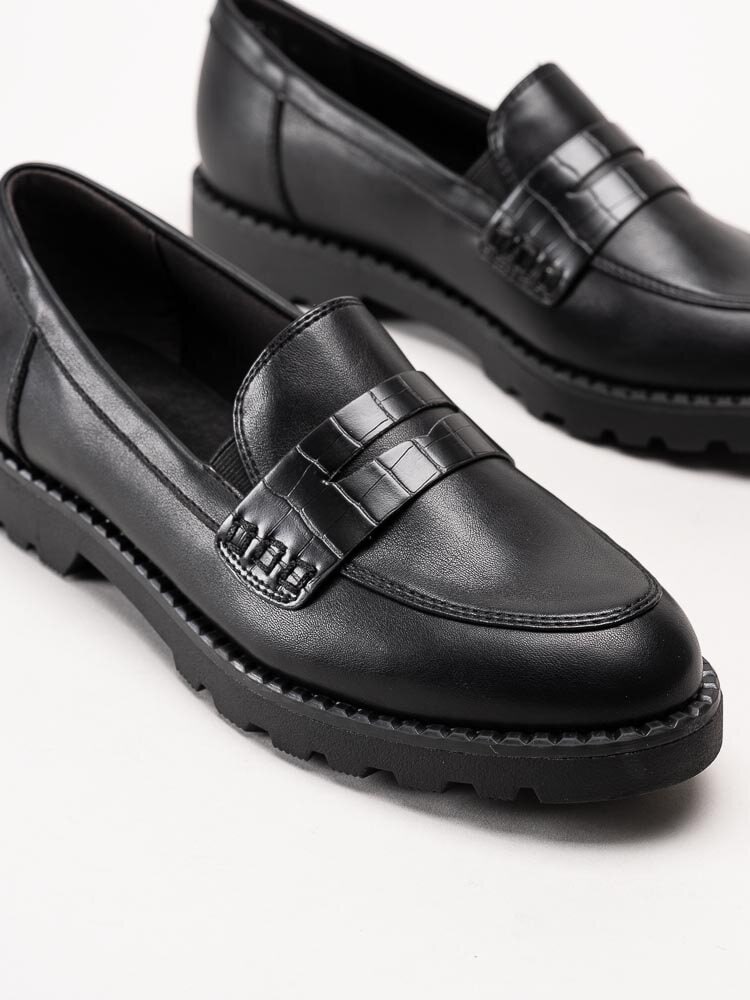 Tamaris - Svarta loafers i mjuk skinnimitation