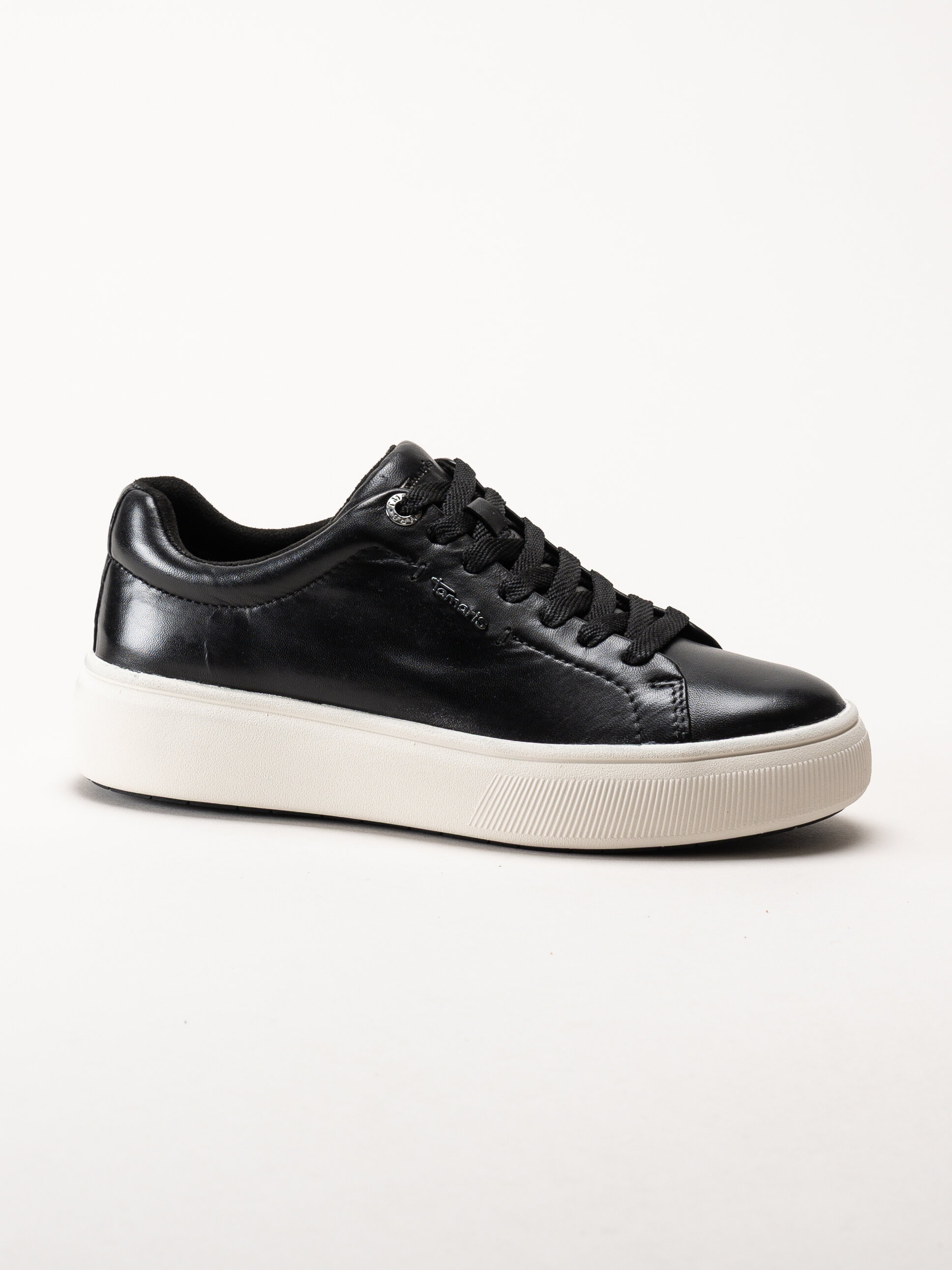 Tamaris - Svarta sneakers i skinn med platåsula