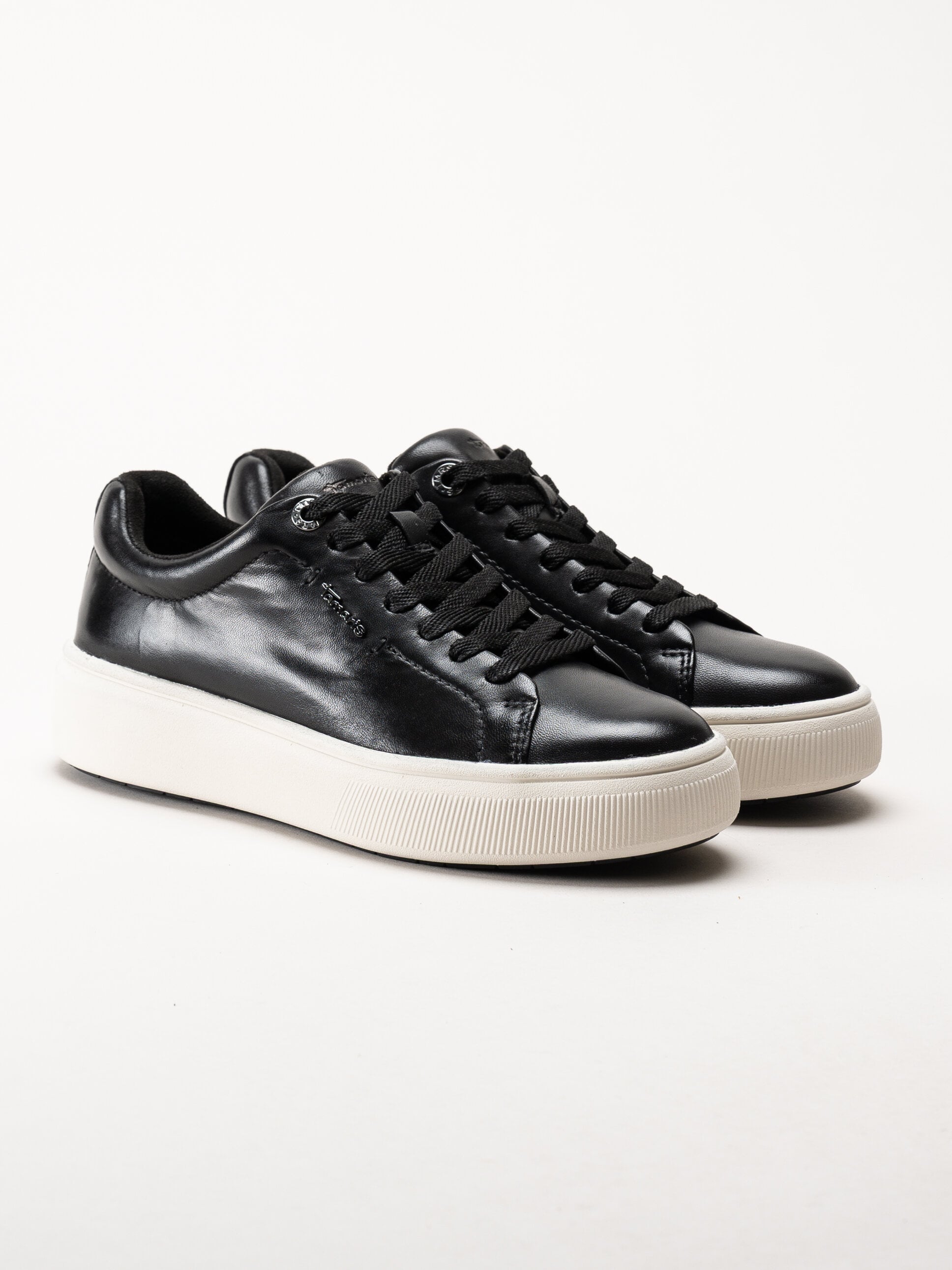 Tamaris - Svarta sneakers i skinn med platåsula
