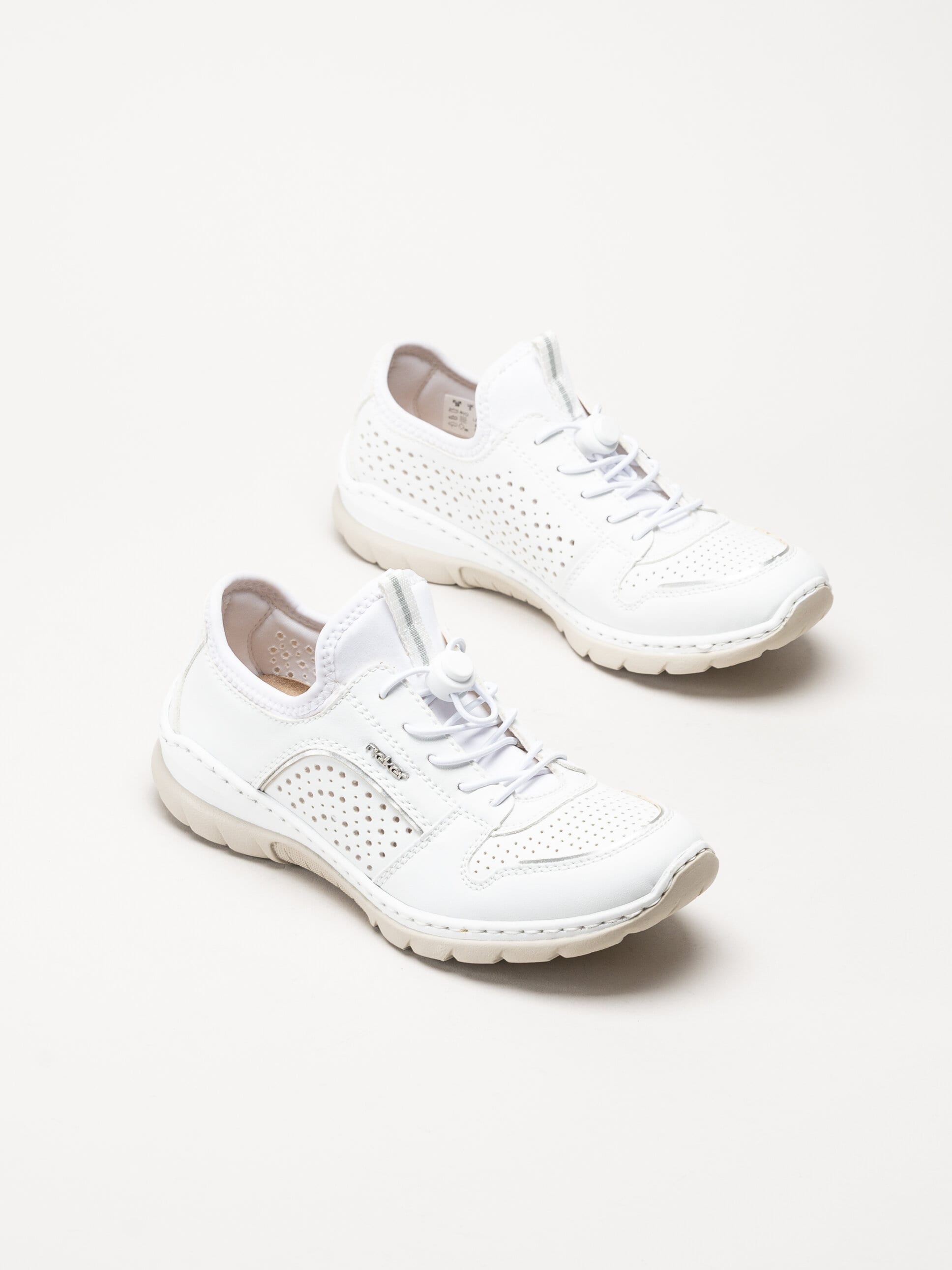 Rieker - Vita slip on skor i skinnimitation