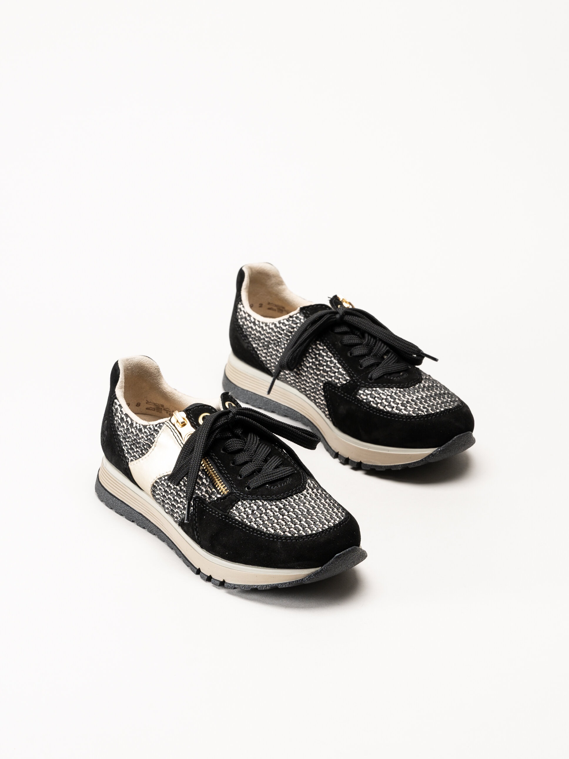 Rieker - Svarta sneakers i mocka och textil