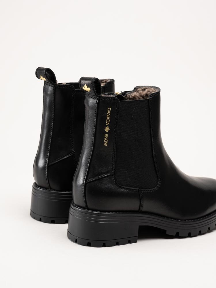 Canada Snow - Mount Kimberly - Svarta boots med fårskinn och dubbar