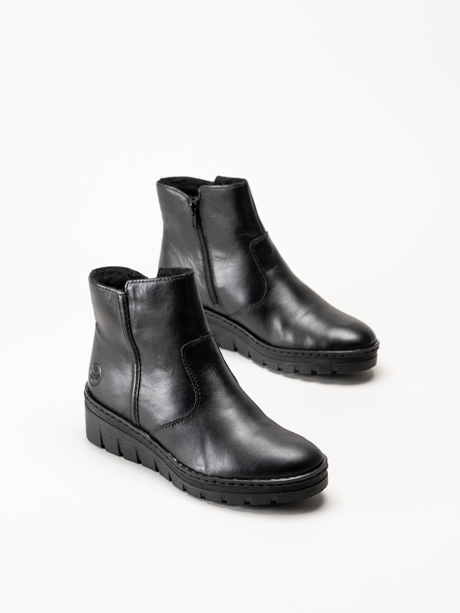 Rieker - Svarta fodrade kilklackade boots