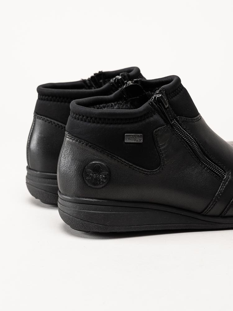 Rieker - Svarta boots i skinn och textil