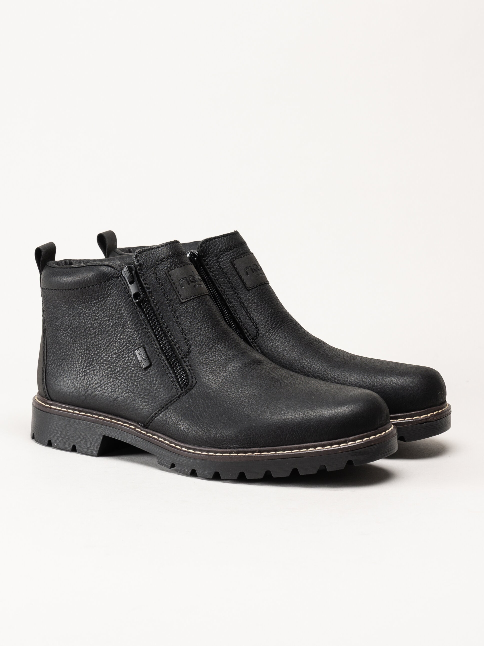 Rieker - Svarta fodrade boots i skinn