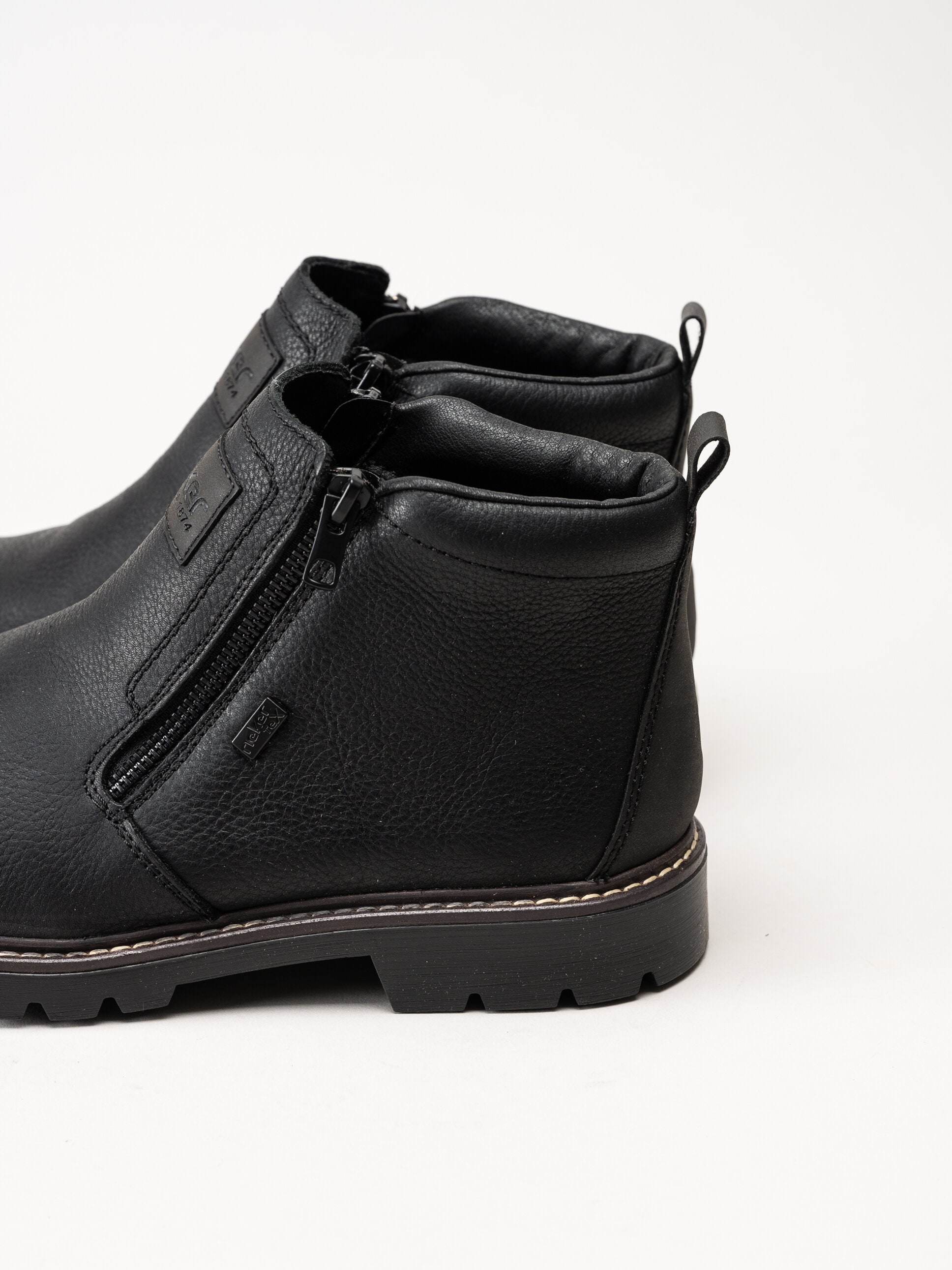 Rieker - Svarta fodrade boots i skinn