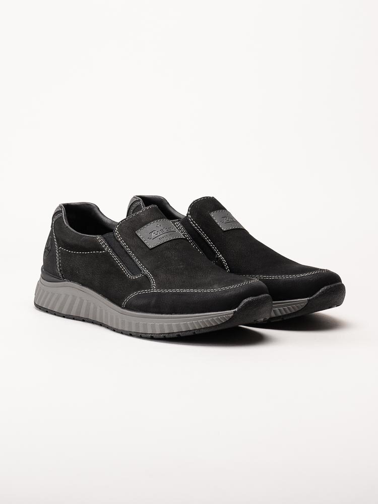 Rieker - Svarta slip on promenadskor i nubuck