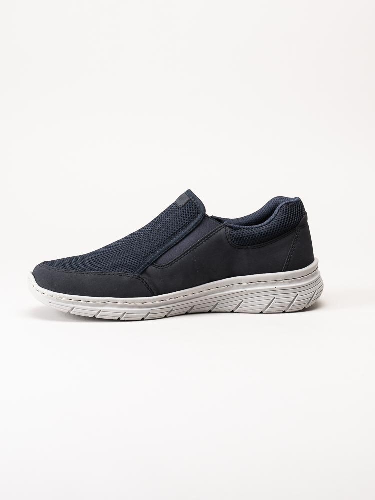 Rieker - Mörkblå slip on skor i textil