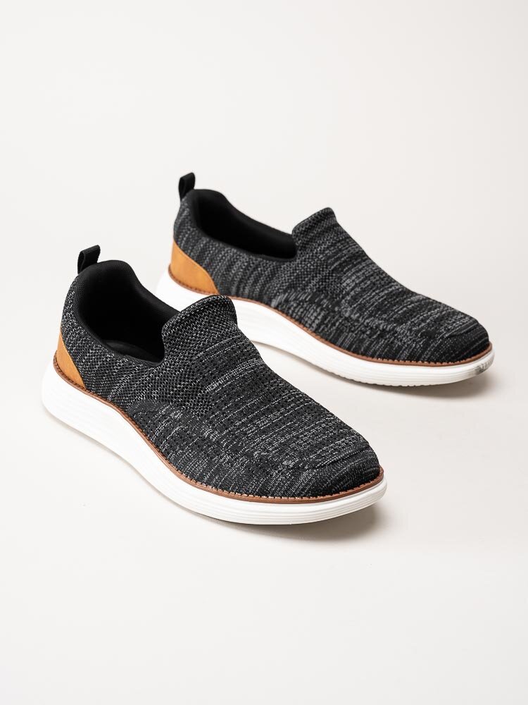 CC Resorts - Svartmelerade slip on skor i textil