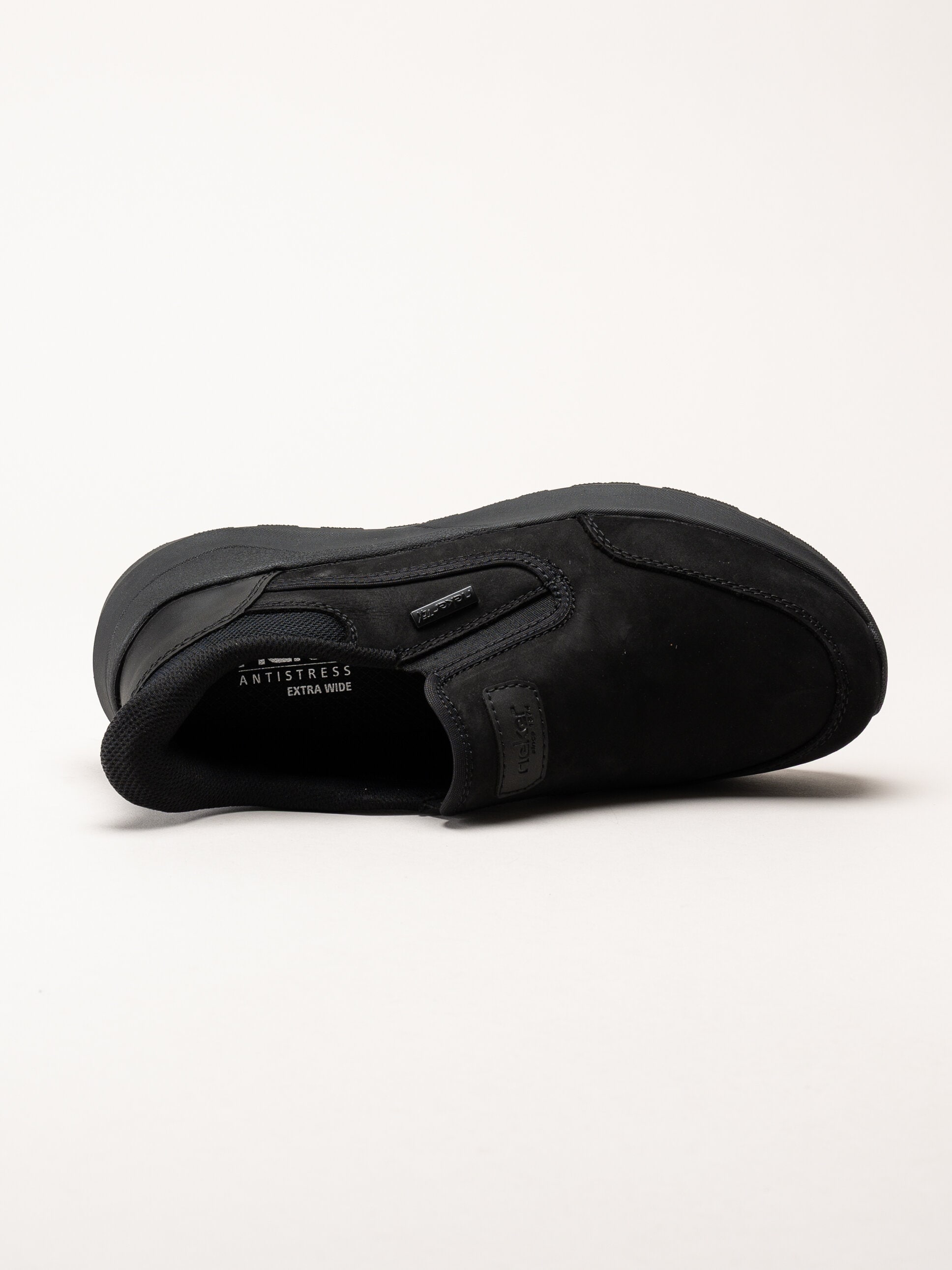 Rieker - Svarta slip on promenadskor i oljad nubuck