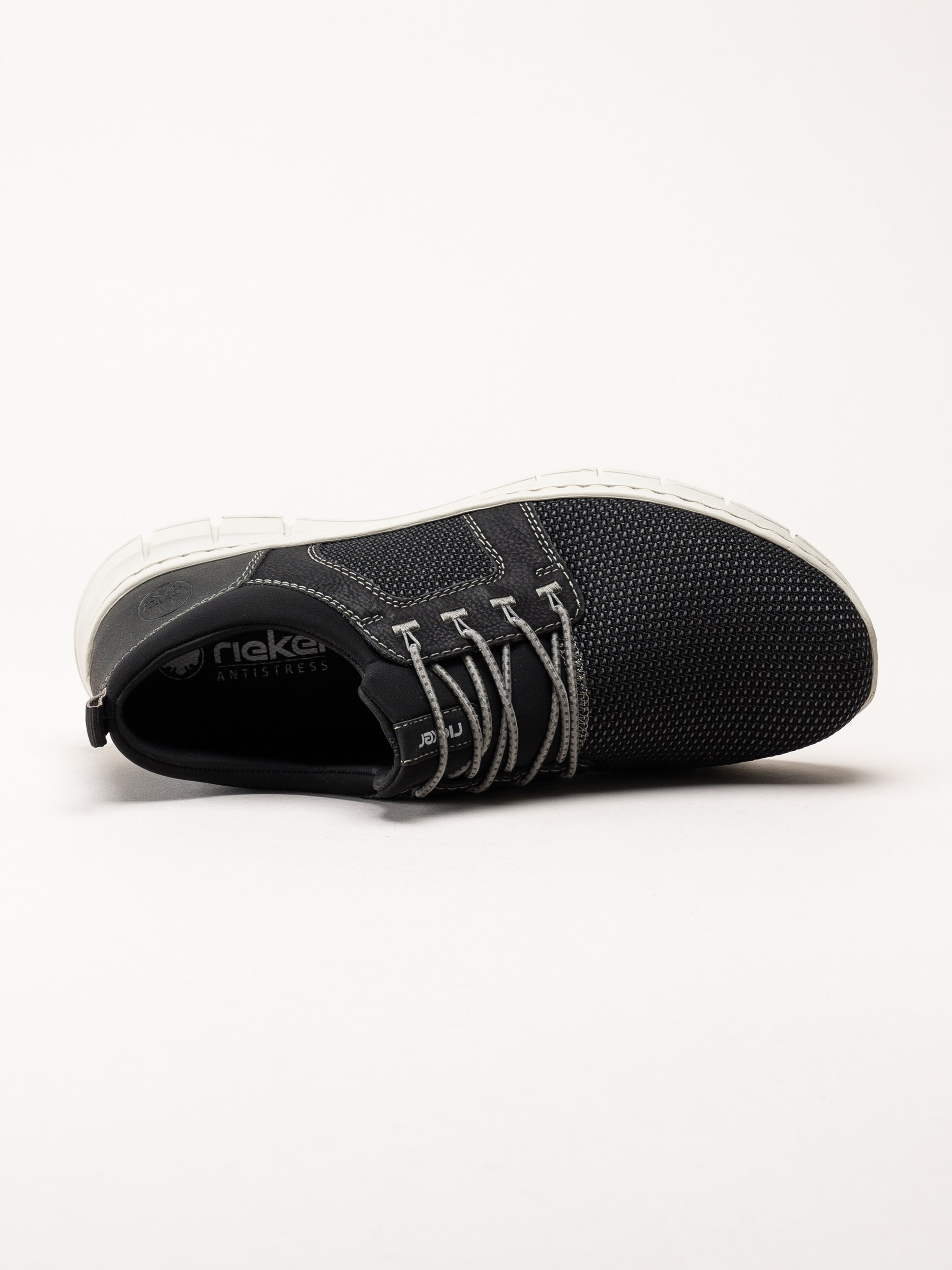Rieker - Svarta sportiga slip on skor
