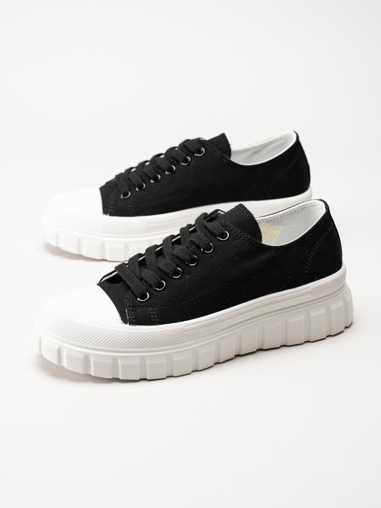 Duffy - Svarta sneakers i textil