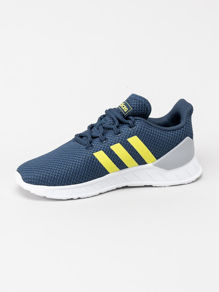 Adidas - Questar Flow Nxt K - Blå sportskor med gröna stripes