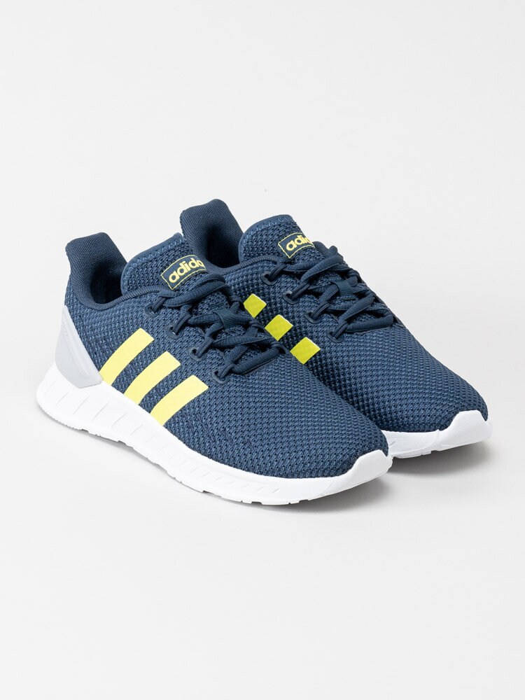 Adidas - Questar Flow Nxt K - Blå sportskor med gröna stripes