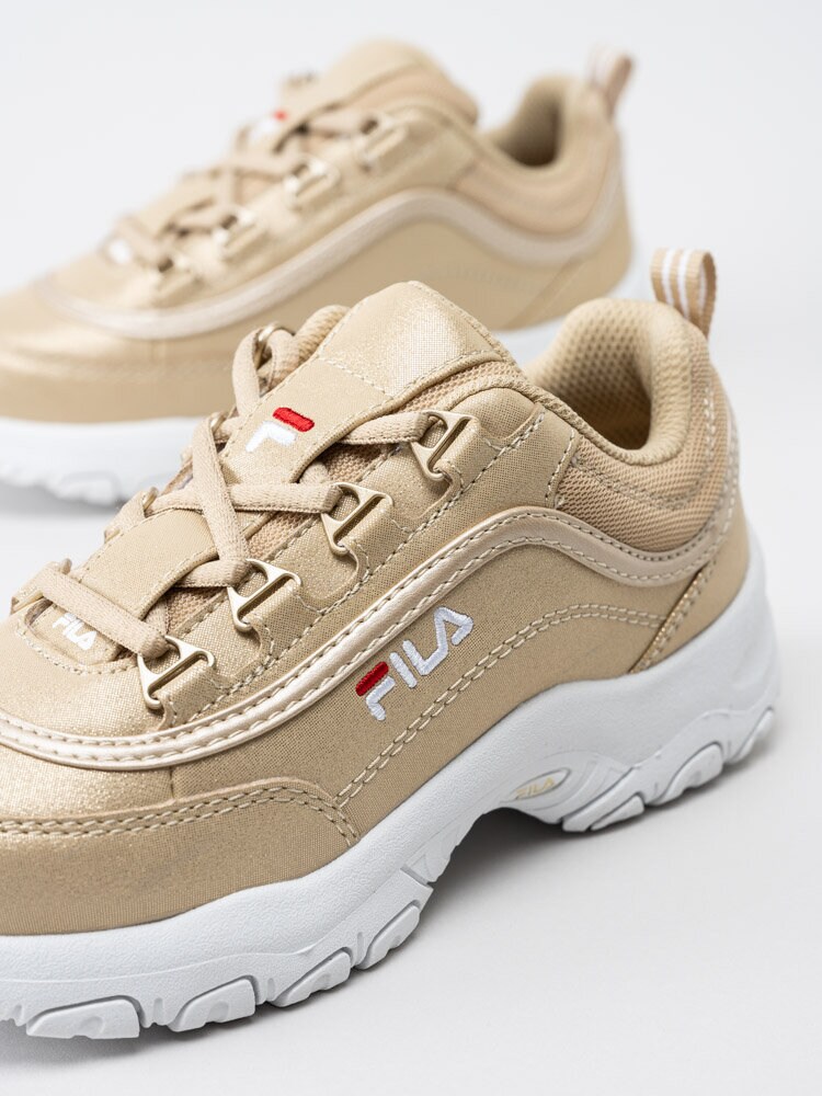 FILA - Strada Low K - Guldfärgade 90-tals sneakers i skinn