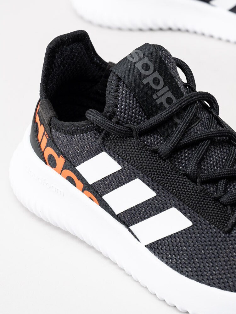 Adidas - Kaptir 2.0 K - Svarta sportskor med orange logga