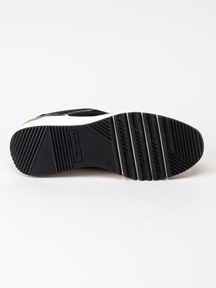 Tamaris - Svarta sneakers i skinn med guldiga detaljer
