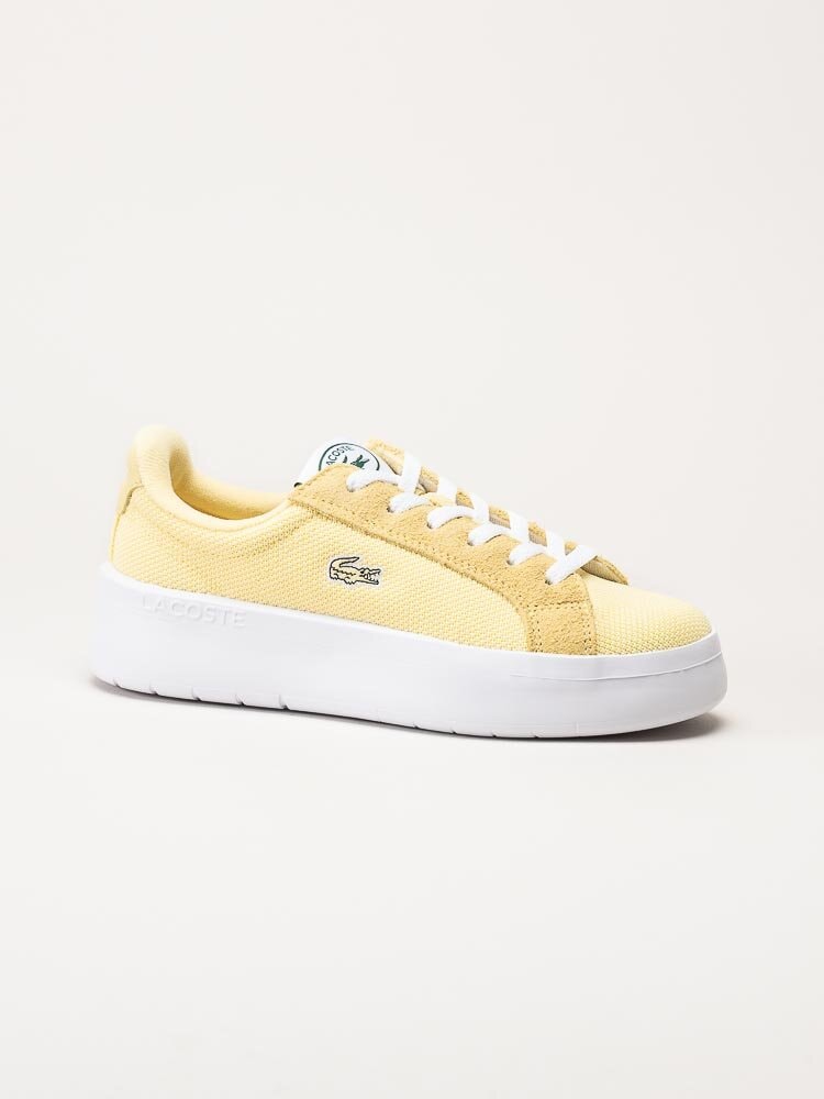 Lacoste - Gula platåsneakers i textil