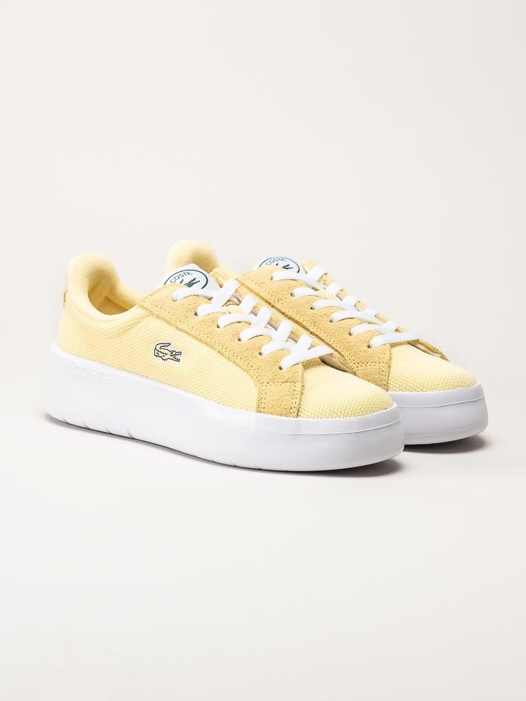 Lacoste - Gula platåsneakers i textil