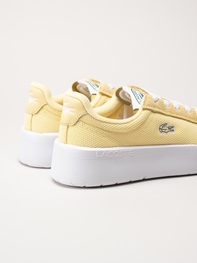 Lacoste - Gula platåsneakers i textil