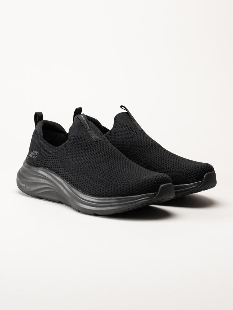 Skechers - Vapor Foam Covert - Svarta slip on sneakers i textil