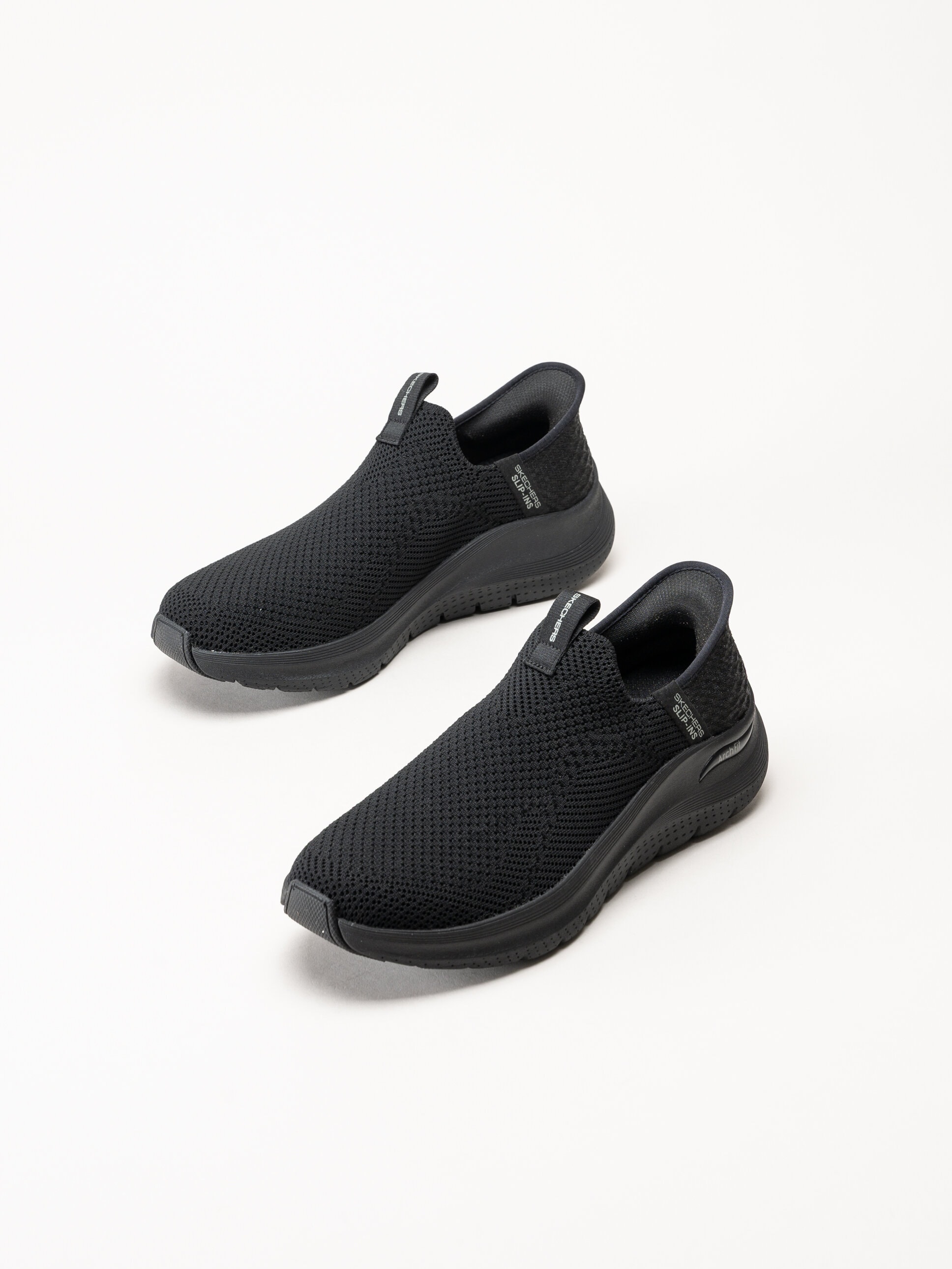 Skechers - Arch Fit 2.0 Crayn - Svarta slip-ins sneakers i mesh