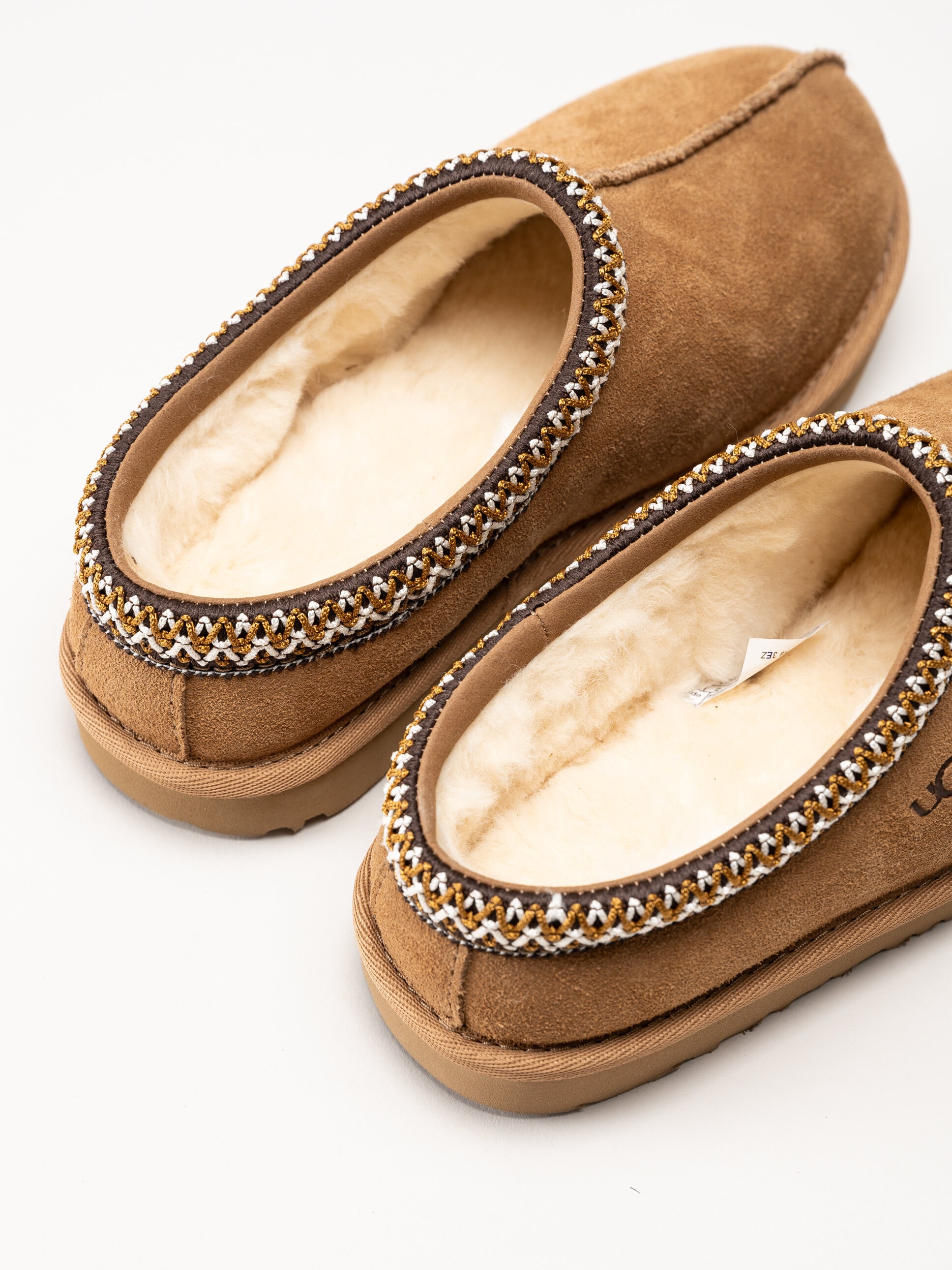 UGG - K Tasman II - Ljusbruna ullfodrade tofflor i mocka