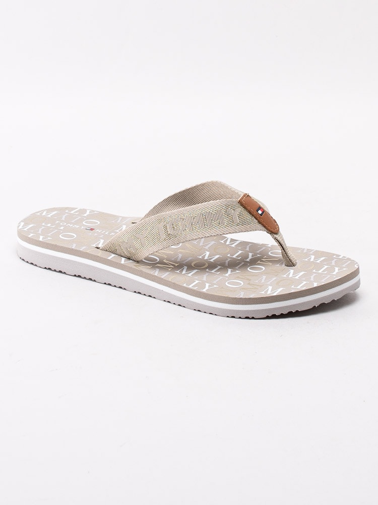 65201071 Tommy Hilfiger Tommy Metallic Flat Beach Sandals FW04807-AEP Beige flip-flops med loggor-1