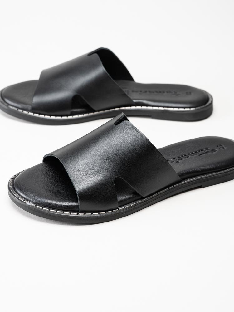 Tamaris - Svarta slip in sandaler med silverfärgad söm